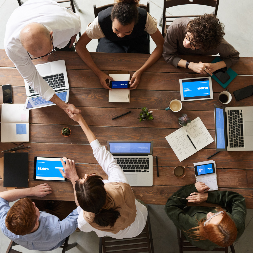 Six persons having a meeting